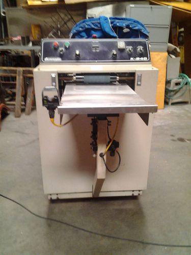 Amscomatic K840,  Tee Shirt Folding Machine