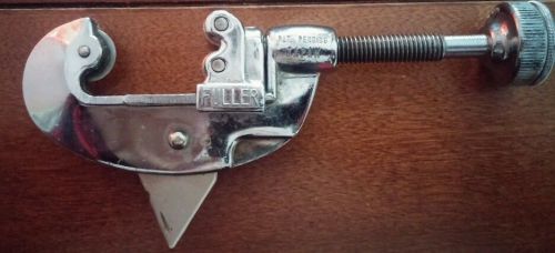 FULLER PIPE CUTTER WITH REAMER AND SPARE CUTTER STORAGE