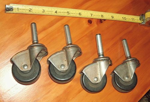 Set of four antique hooded swivel ball bearing casters, make unknown