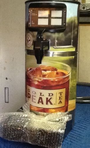 new gold peak 4 flavor iced tea dispencer with automatic bar controles