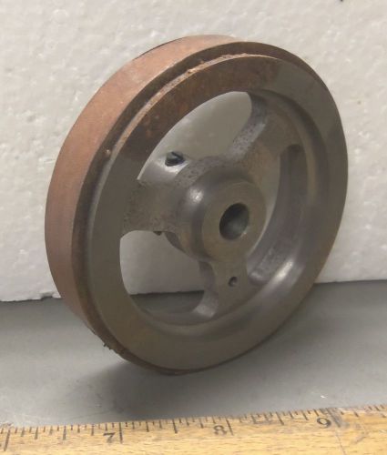 Steel pulley (?) / wheel with leather strap (nos) for sale