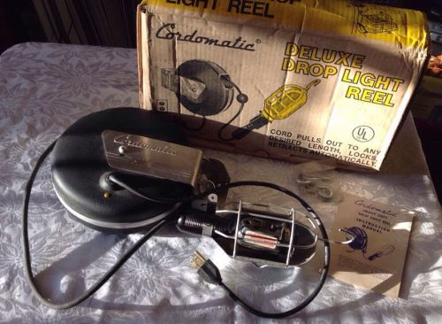 Deluxe cordomatic heavy duty drop light reel w/original box for sale