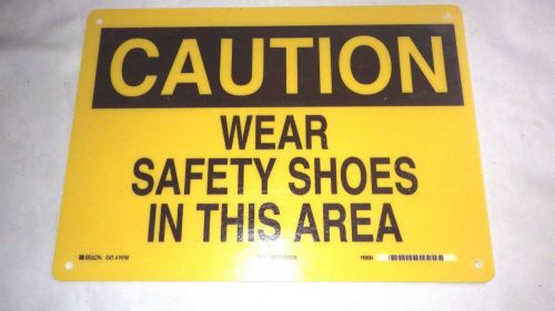NEW OSHA sign caution sign Safety Shoes Sign 10&#034; x 14&#034; Brady 25207 Yellow/Black