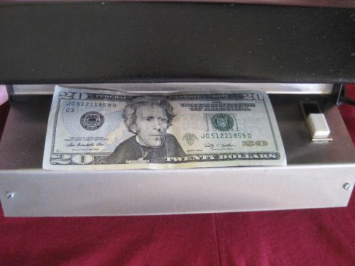 Counterfeit money detector