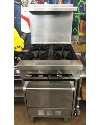 Mint condition garland x24-4l sunfire 4 burner gas range with space saver oven for sale