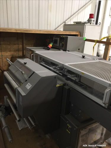 Used-ima automatic overwrapping machine, machine capability: complete overwrappi for sale