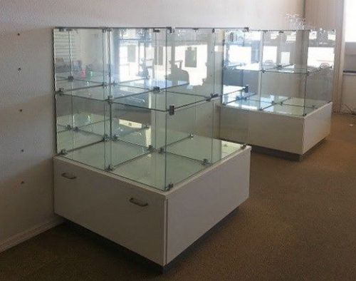 used but look new Glass Display Cabinets, made in Germany,