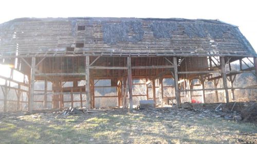 mid 1800s barn frame and hand hued beams