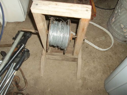 homemade wood stand wire winder for electic wire work pretty slick winder only