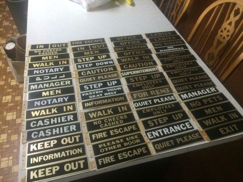 Sixty (60) NOS Vintage Tin/Brass 2 in x 8 in signs Antique