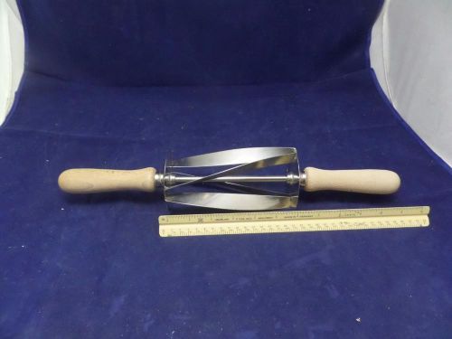 Croissant cutter with wood handles #5 6&#034; x 4 1/8&#034; used ec f2 for sale