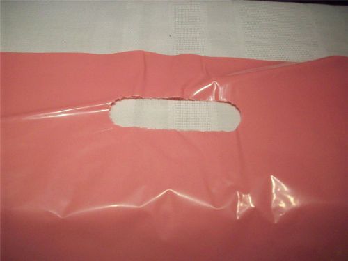 100 Pcs 12 x15 Plastic Merchandise Bags Die Cut Handle Candy Pink Premium Glossy