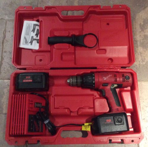 Milwaukee 12 volt hammer drill with case charger &amp; batteries for sale