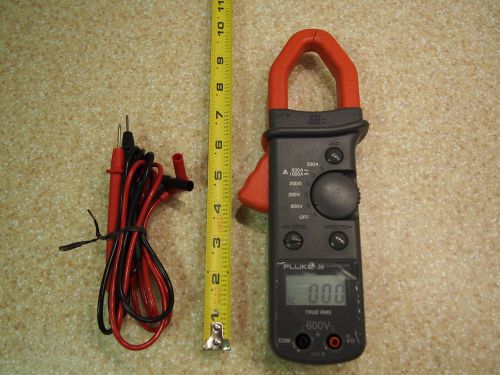 NEW FLUKE CLAMP METER. AC/DC TRUE RMS NEVER USED. SAVE $$$ NO RESERVE