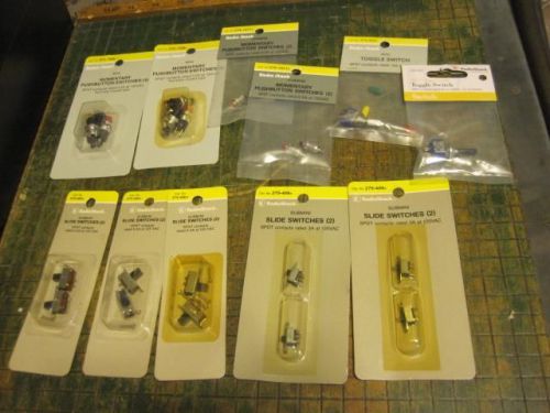 Lot of 11 packages of slide and toggle switches - 275-406a - 275-409a - 275-664 for sale