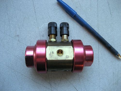 compressor T-adapter 6618638, 2 out, 1 in, looks like either air or liquid valve