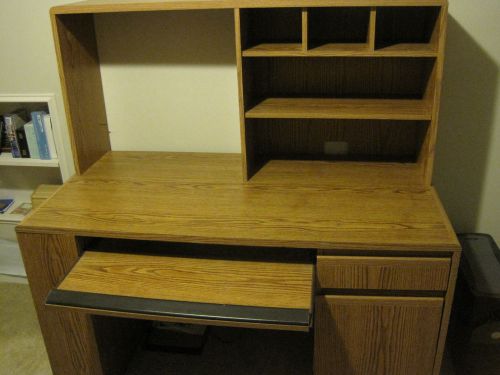Wood computer desk with drawer, file cabinet, and shelves