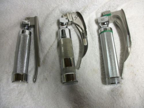 Laryngoscope handles with blades
