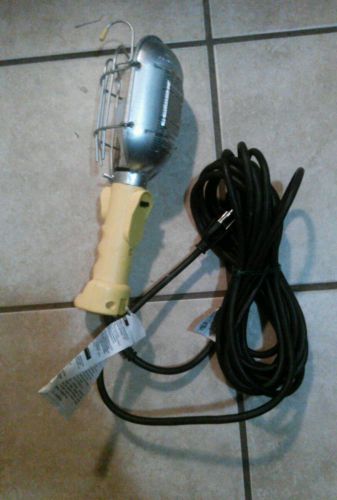 Used Bayco Electric Incandescent Trouble Light With A 25Ft. Cord Yellow Color