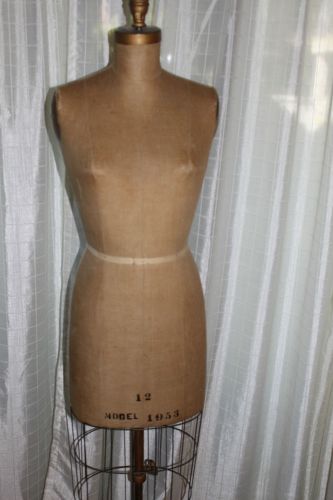 Vintage mannequin collapsible dress form.