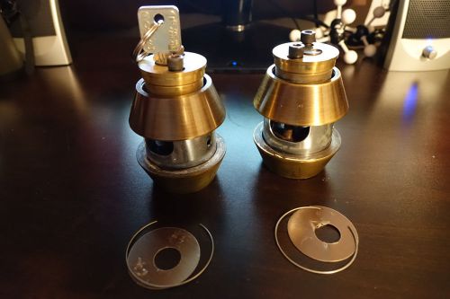 Two medeco locks - both are double cylinder - and one key for sale