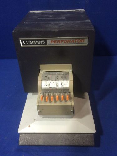 Cummins Allison 304 Electric 6 Character Perforator w/tape on it