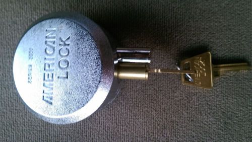 American shackleless hockey puck style padlock