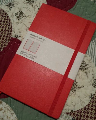 Classic red MOLESKINE legendary hardback notebook SQUARED paper