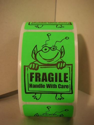 FRAGILE HANDLE WITH CARE Cute Alien Holding Sign Sticker Green Fluor 50 labels