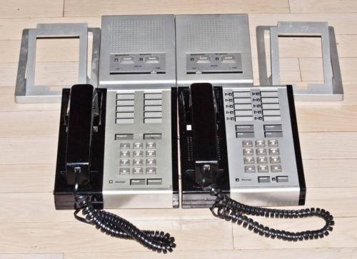 Two AT&amp;T Merlin 10 Button Phones w/stands and speaker phone