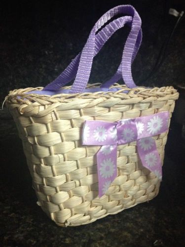 Small Straw Basket lined Purpl Fabric and Ribbon Handles to Pack Beautiful Gifts