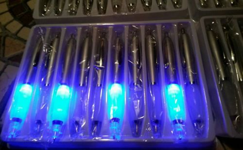 Ballpoint pens liteup blue new 10 lot black ink silver tone well made.