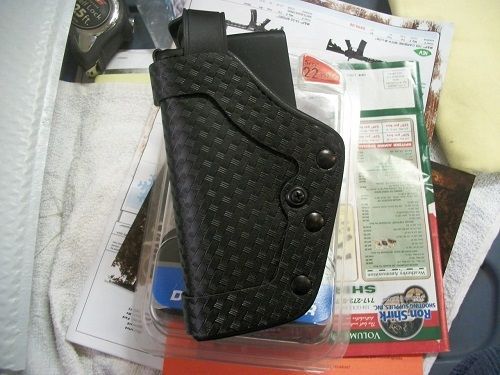 Uncle Mikes Black Pro-3 Duty Holster  Mirage Basketweave Size 22 LH 3522-6