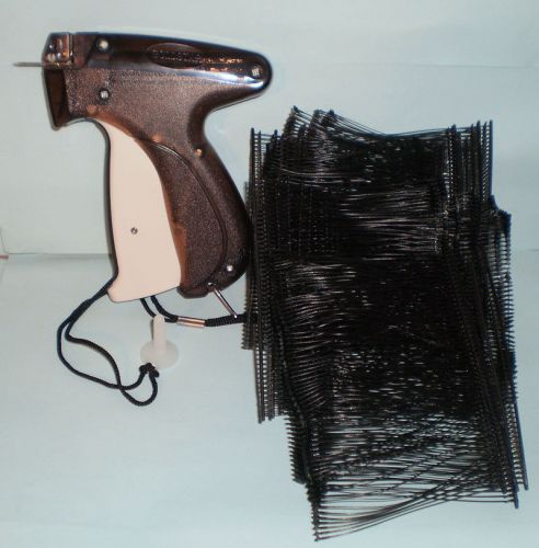 Fine clothing garment price tagger tag tagging gun with 1000 black barbs for sale