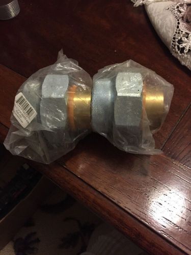 Two dielectric unions, 1 1/2 inch with copper sweat brand new never opened for sale