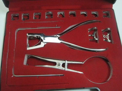 New 4, four starter rubber dam kits with 14 pieces dental surgical instruments for sale