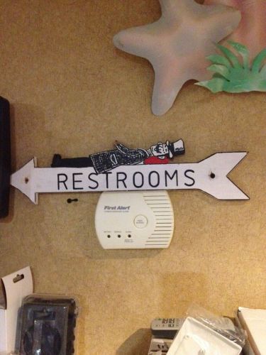 restroom sign arrow