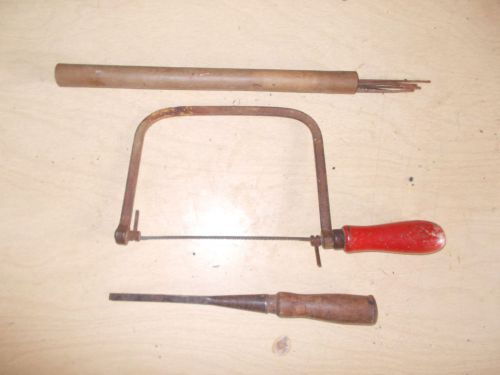 vintage Willard saw with 10 blades and a wood tool