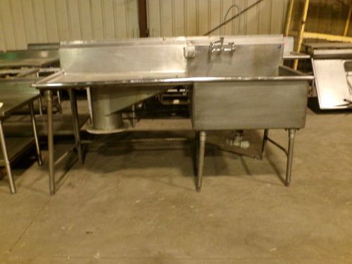 Large stainless steel sink with drainboard with garbage chute