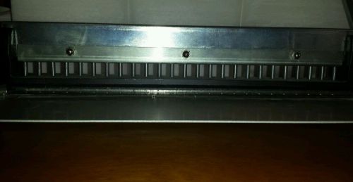 25 hole paper metal plate punch, great condition, used for sale