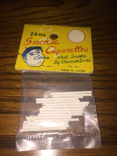 Vintage NOVELTY TRICK SMOKIE CIGARETTES Toy in Bag for Smoking Monkey Toy