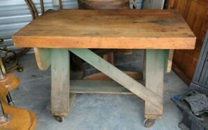 Vintage, sturdy workbench on wheels. Well built table display, 
