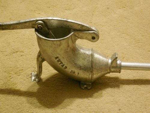 Cast iron manual sausage stuffer with tube tip good condition for sale