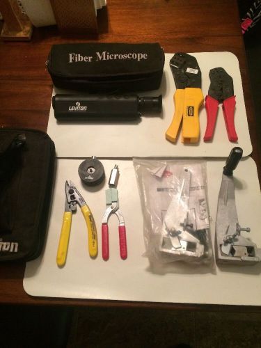 lot of assorted electricians tools, strippers, crimpers.
