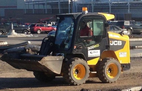 USED 2011 JCB 300 SIDE DOOR SAFETY WHEELED SKID STEER FOR HOME OR CONSTRUCTION
