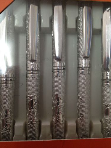 11 new pens silver color in orginal box very nice