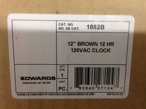 Edwards Cat# 1882B 8&#034; Brown 12HR 120VAC Clock