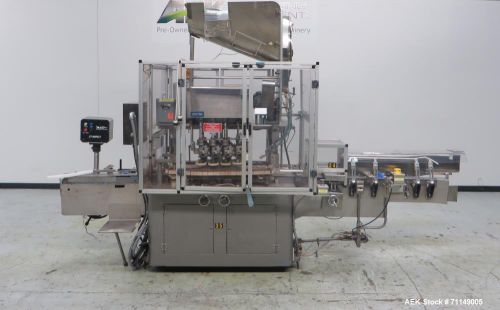 Used- Resina Model UN-40 Automatic Inline Quill Style Screw Capper. Machine is c