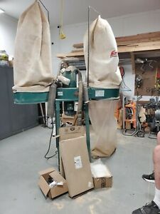 4HP grizzly industrial dust collector good condition comes with extra parts