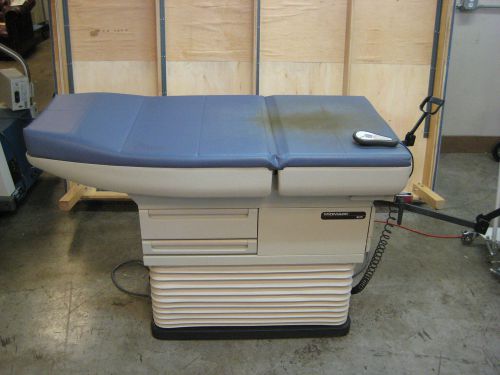 Midmark 405 power exam table with power up/down and power back, guaranteed